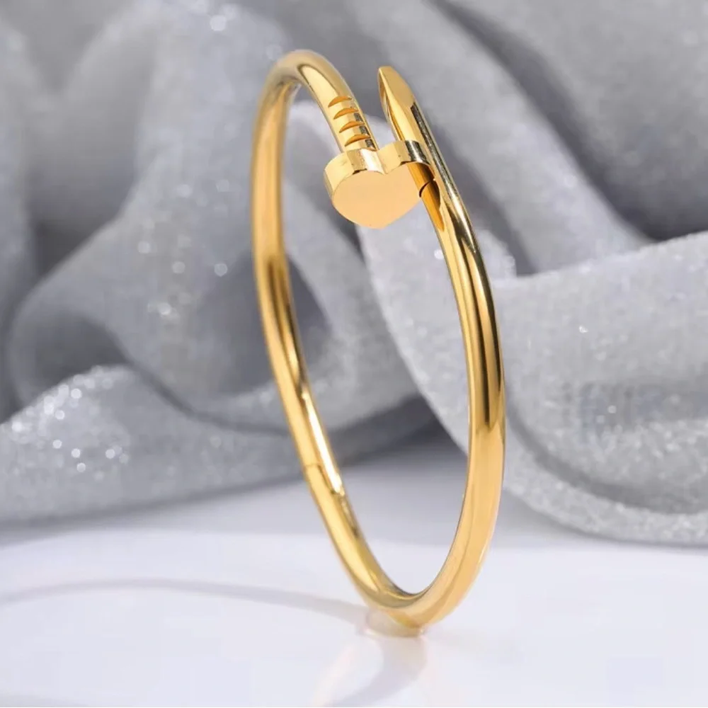 Love inspired Nail Heart Bangle Bracelet. Stainless Steel 18K Gold Plated - Picture 1 of 4